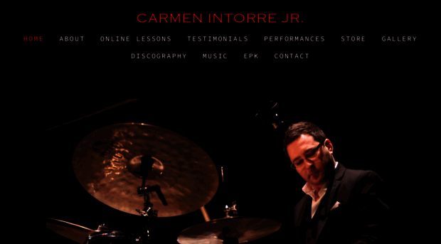 carmenintorrejr.com