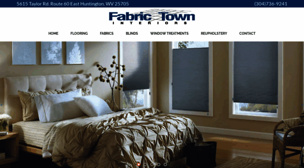 fabrictowninteriors.com