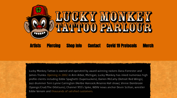 luckymonkeytattoo.com