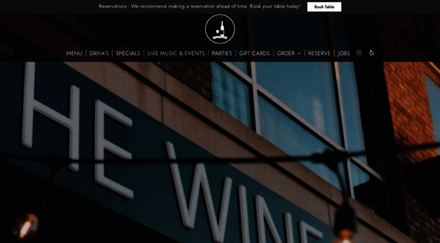 wineloftcharlotte.com