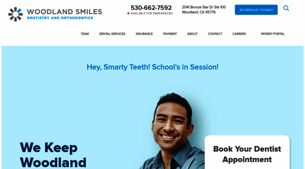 woodlandsmilesdental.com